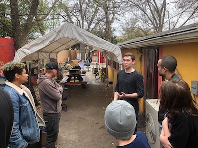 middle schoolers taking a tour of a sanctuary site